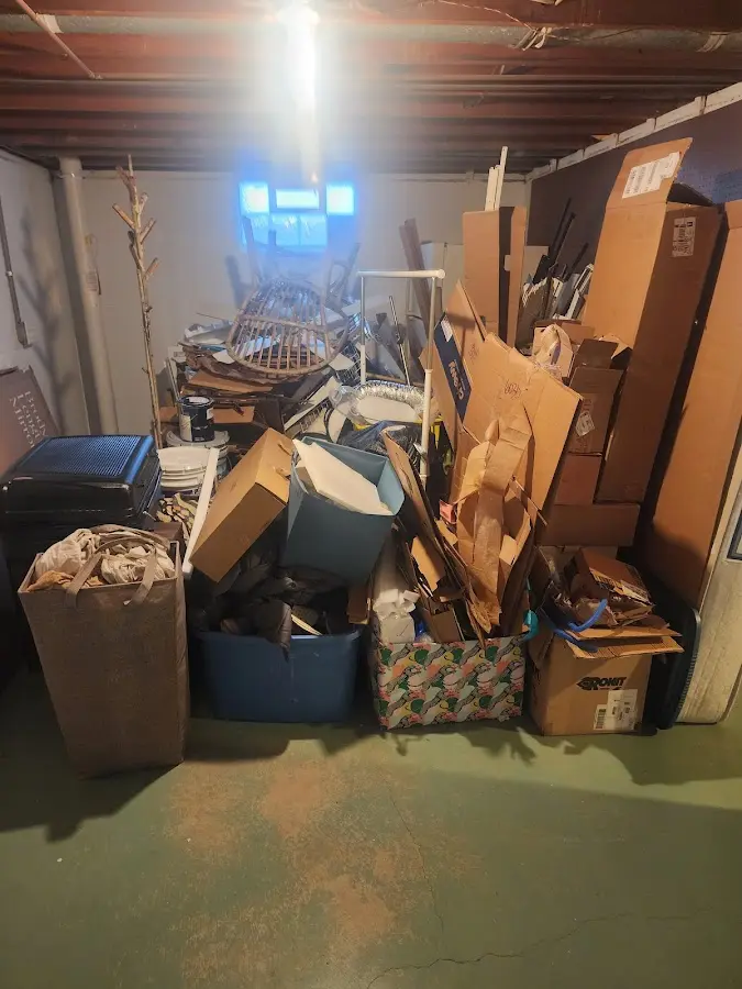 Roll-off dumpster container at job site for 2 Yard Dumpster Rental in Fairport